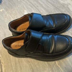 Used black dress shoe